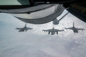 F-16 pilots, KC-135 crews team for mid-air refueling training F-16 pilots, KC-135 crews team for mid-air refueling training